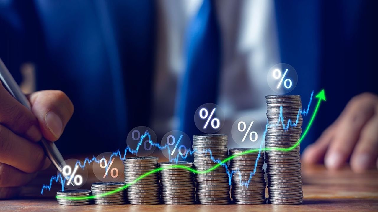 Businessman putting down money, pointing with pen and showing candlestick symbol for investing, finance, saving money, interest rate or dividend investment, business growth concept.
